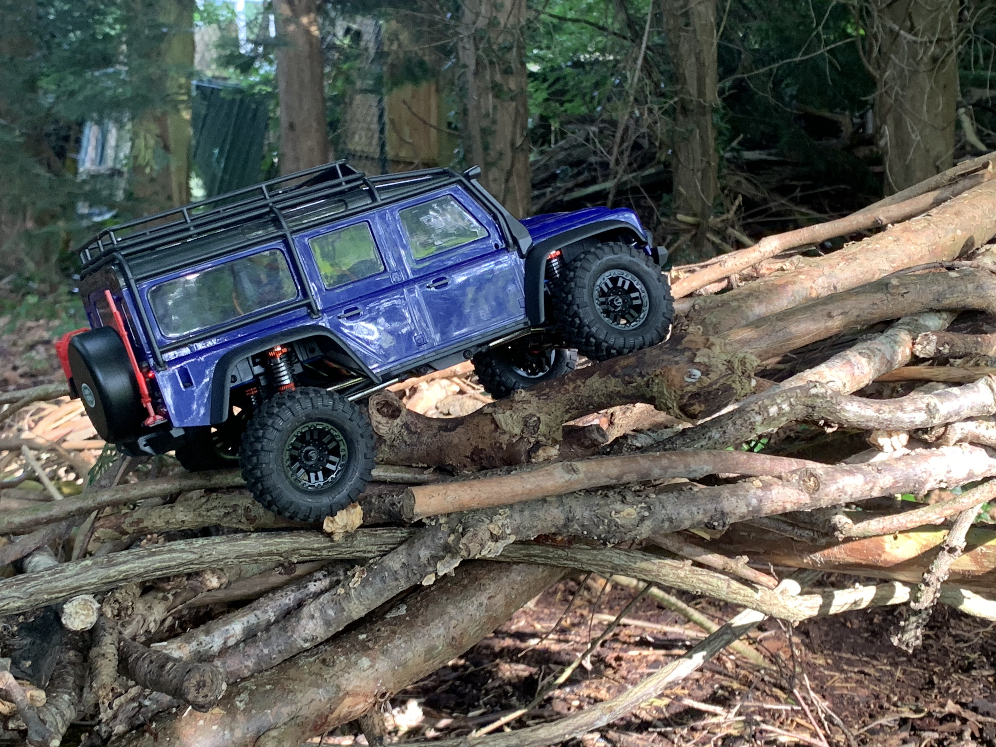 Axial SCX24 scaling the rock face section of the Orbital RC crawler course